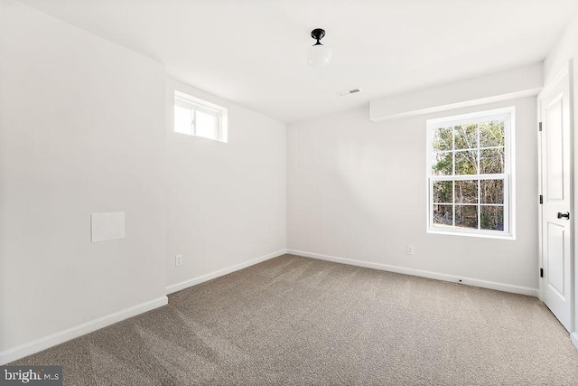 unfurnished room with carpet