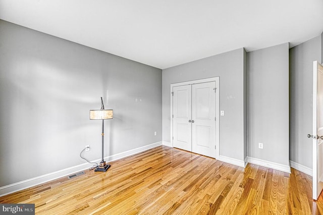 unfurnished bedroom featuring light hardwood / wood-style flooring