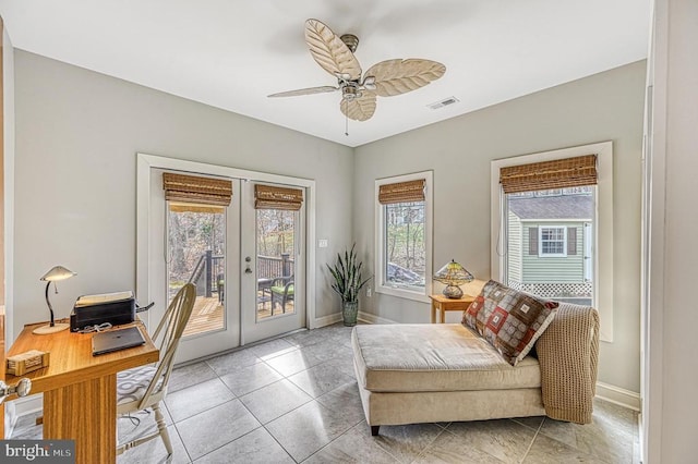 office area featuring ceiling fan, french doors, and light tile patterned floors