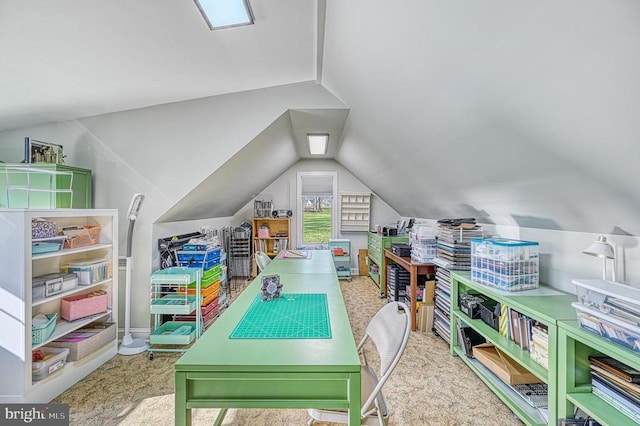 recreation room featuring vaulted ceiling