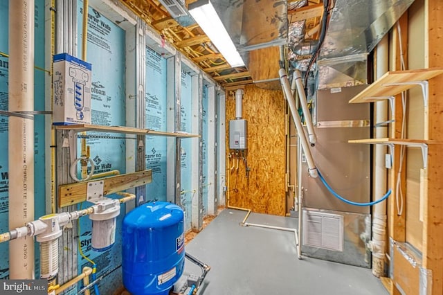 utility room with water heater