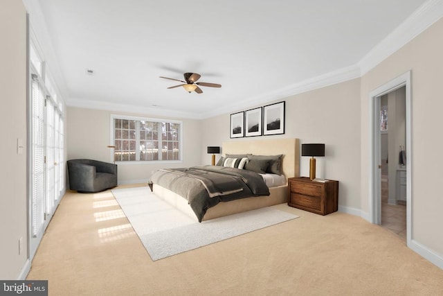 bedroom with ceiling fan, light carpet, and ornamental molding