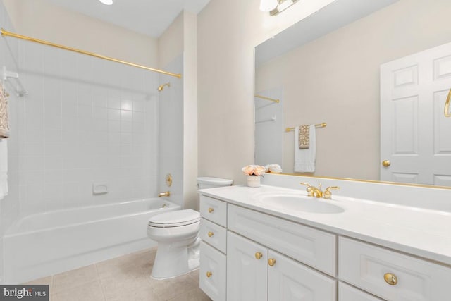 full bathroom featuring tile patterned floors, vanity, toilet, and tiled shower / bath