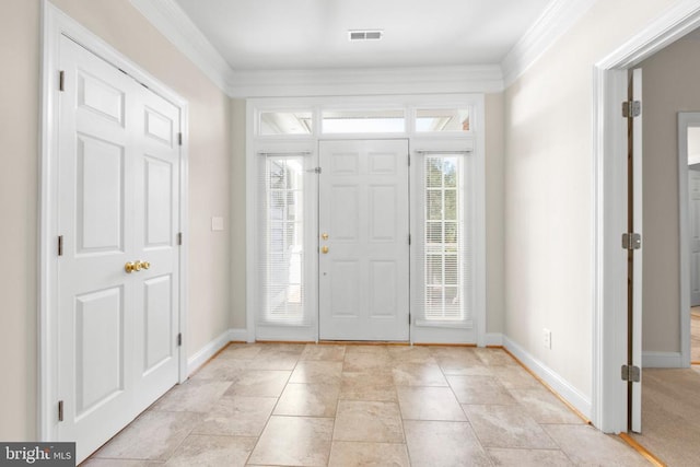 entrance foyer with crown molding