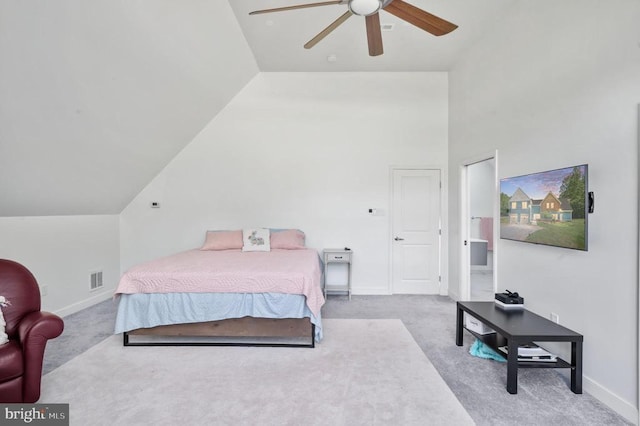 carpeted bedroom featuring ceiling fan and lofted ceiling