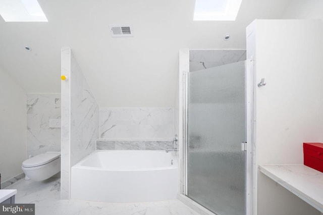 bathroom with toilet, independent shower and bath, and a skylight