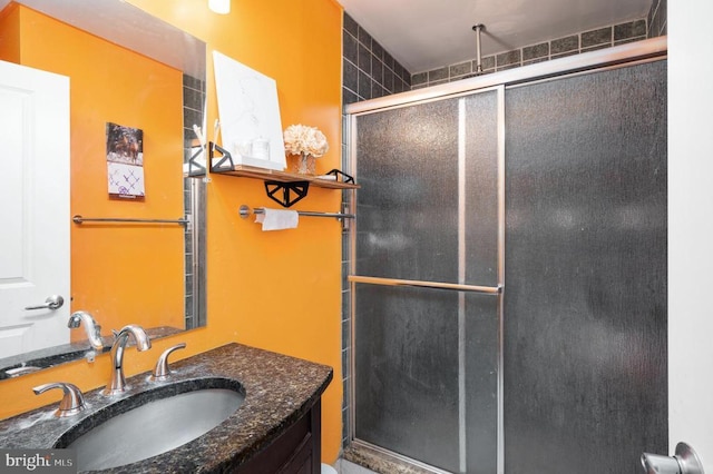 bathroom with vanity and walk in shower