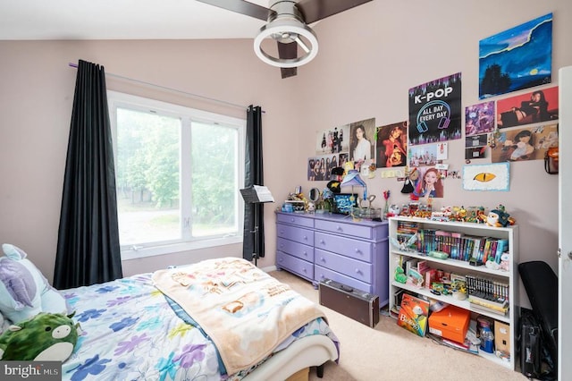 bedroom with ceiling fan and lofted ceiling