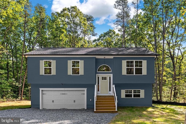 raised ranch with a garage