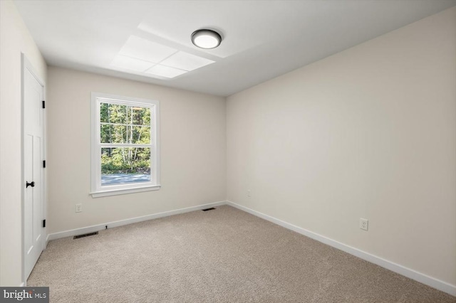 unfurnished room featuring carpet floors