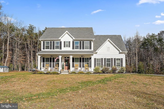 colonial inspired home with a front lawn and a porch