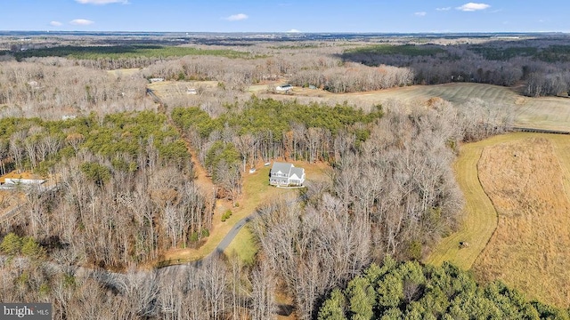 birds eye view of property featuring a rural view