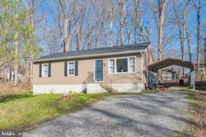 view of front of house with a carport