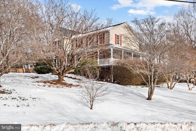 view of snow covered property