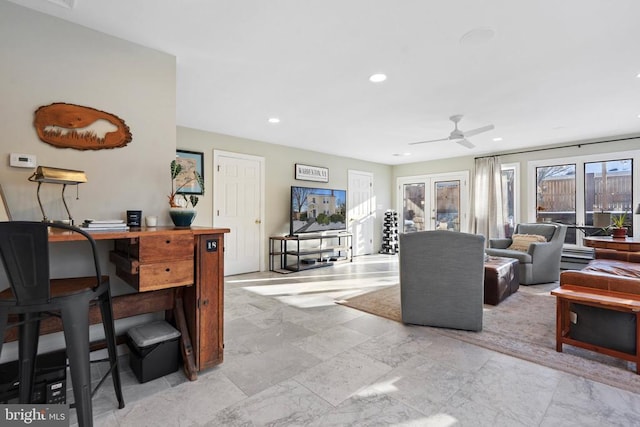 living room with ceiling fan