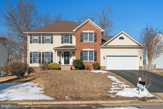 colonial inspired home with a garage