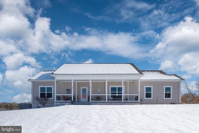 view of front of property featuring covered porch