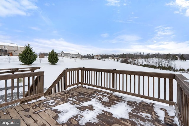 view of snow covered deck