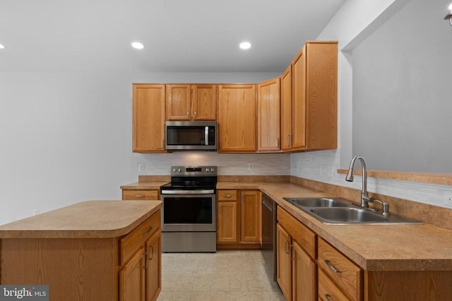 kitchen with appliances with stainless steel finishes and sink