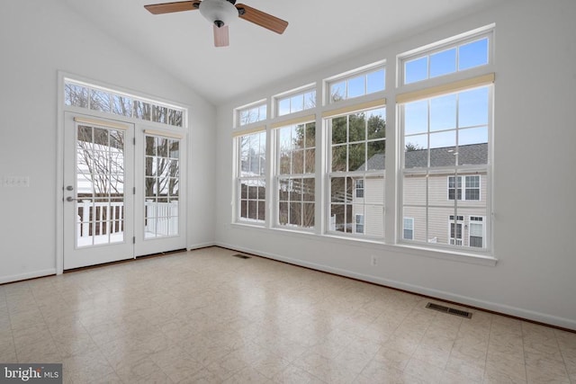 unfurnished sunroom featuring ceiling fan and lofted ceiling