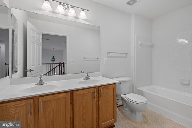 full bathroom featuring toilet, shower / tub combination, and vanity