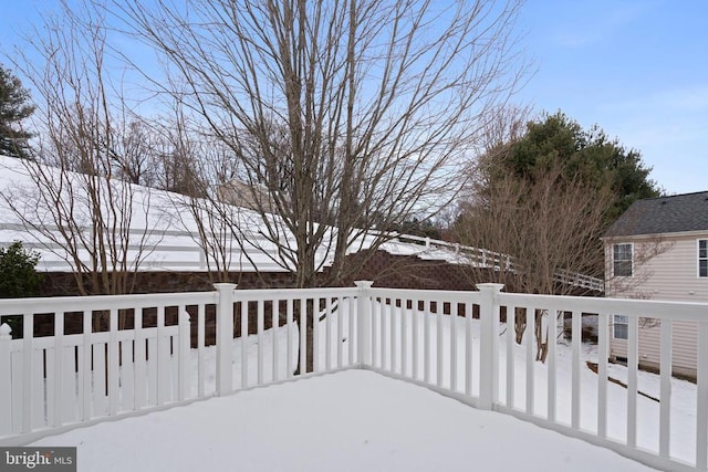 view of snow covered deck