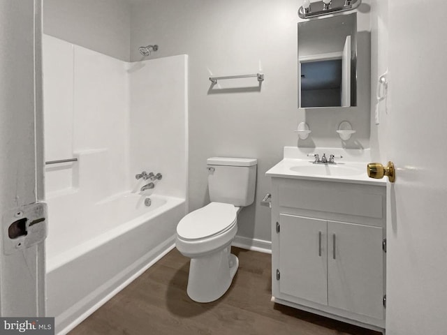 full bathroom featuring shower / washtub combination, toilet, vanity, and wood-type flooring