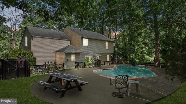 view of pool featuring a patio area