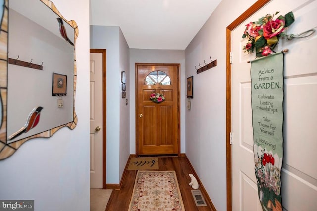 doorway featuring hardwood / wood-style flooring