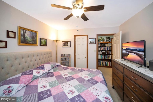 carpeted bedroom featuring ceiling fan