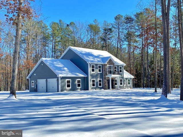 colonial-style house featuring a garage