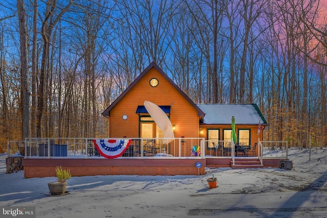 view of front of property with a deck