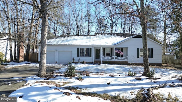 ranch-style house featuring a garage