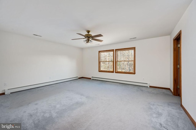 unfurnished room featuring ceiling fan, light colored carpet, and baseboard heating