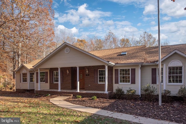 single story home with covered porch