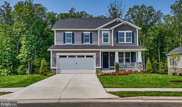 craftsman-style home featuring a front lawn, a porch, and a garage