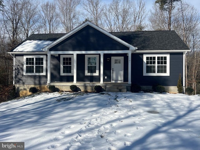 single story home with covered porch