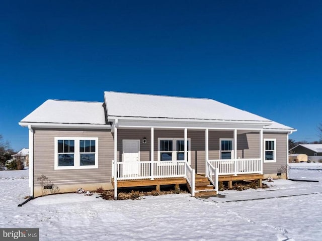 view of front of property featuring covered porch