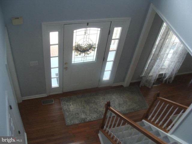 entryway featuring dark wood-type flooring