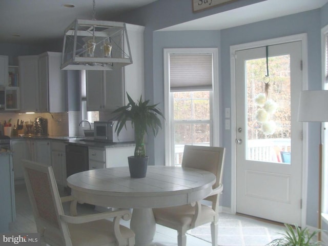 dining area featuring sink