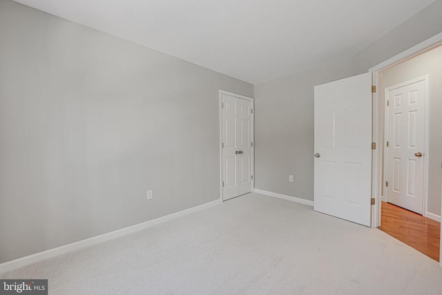 unfurnished bedroom with carpet floors