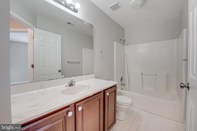 full bathroom featuring vanity, toilet, tub / shower combination, and tile patterned flooring