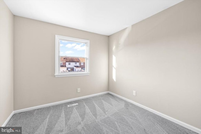 view of carpeted spare room