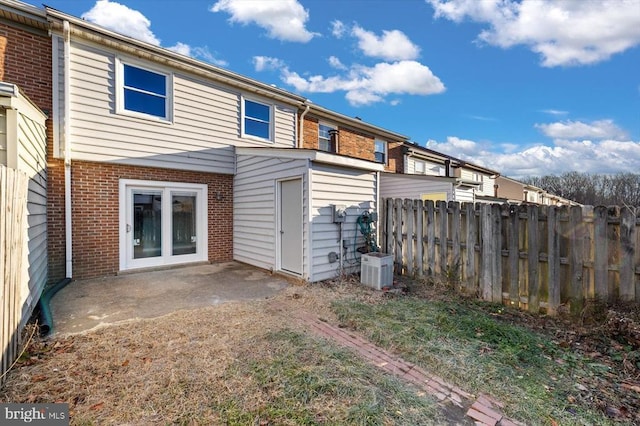 rear view of house with a patio area