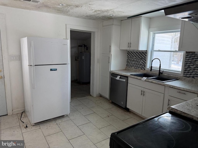 kitchen with gas water heater, white fridge, stainless steel dishwasher, and white cabinets