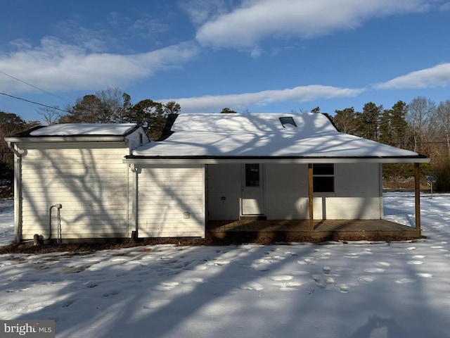 view of snow covered property