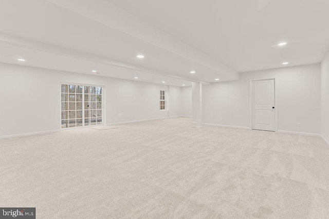 basement with light colored carpet