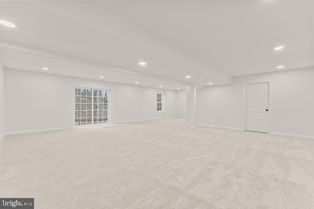 basement with light colored carpet