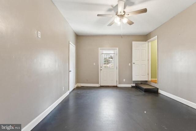 interior space featuring ceiling fan