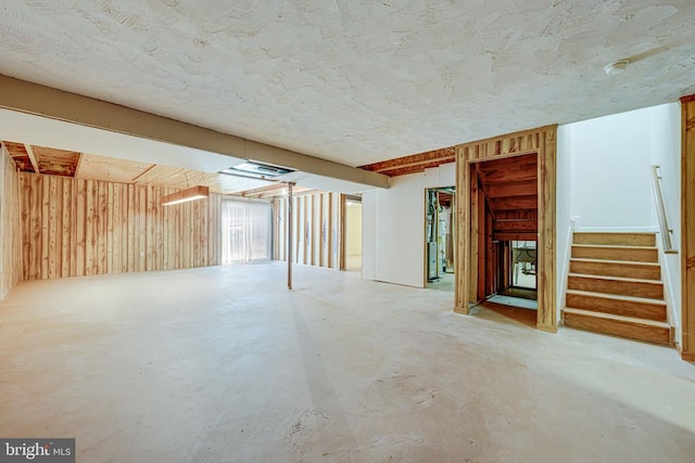 basement with wood walls